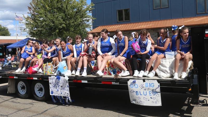 Princeton cheerleaders ride a float during the 54th annual Homestead Festival parade on Saturday, Sept. 6, 2025 in Princeton.
