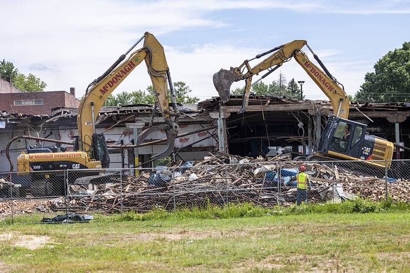 McDonagh Demolition is working two excavators to demolish the Micro Industries building in Rock Falls. The company has a 60-day contract with the city to complete the work.