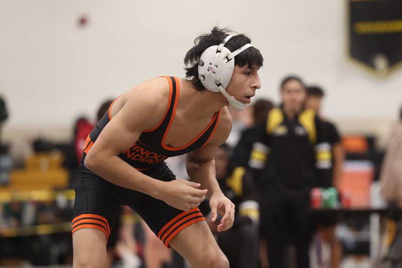 Noah Avina of Minooka faces off with Joseph Pedrosa of Joliet in the 120-pound weight SPC Conference championship match at Joliet West on Saturday, Jan 25, 2025.