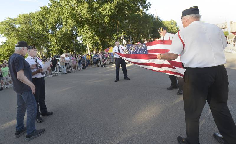 Ottawa American Legion Post 33 held a Flag Day Ceremony Friday night during the Ottawa Cruise Night. The history of the flag and the 13 folds that go into preparing for storage and shipment were explained.