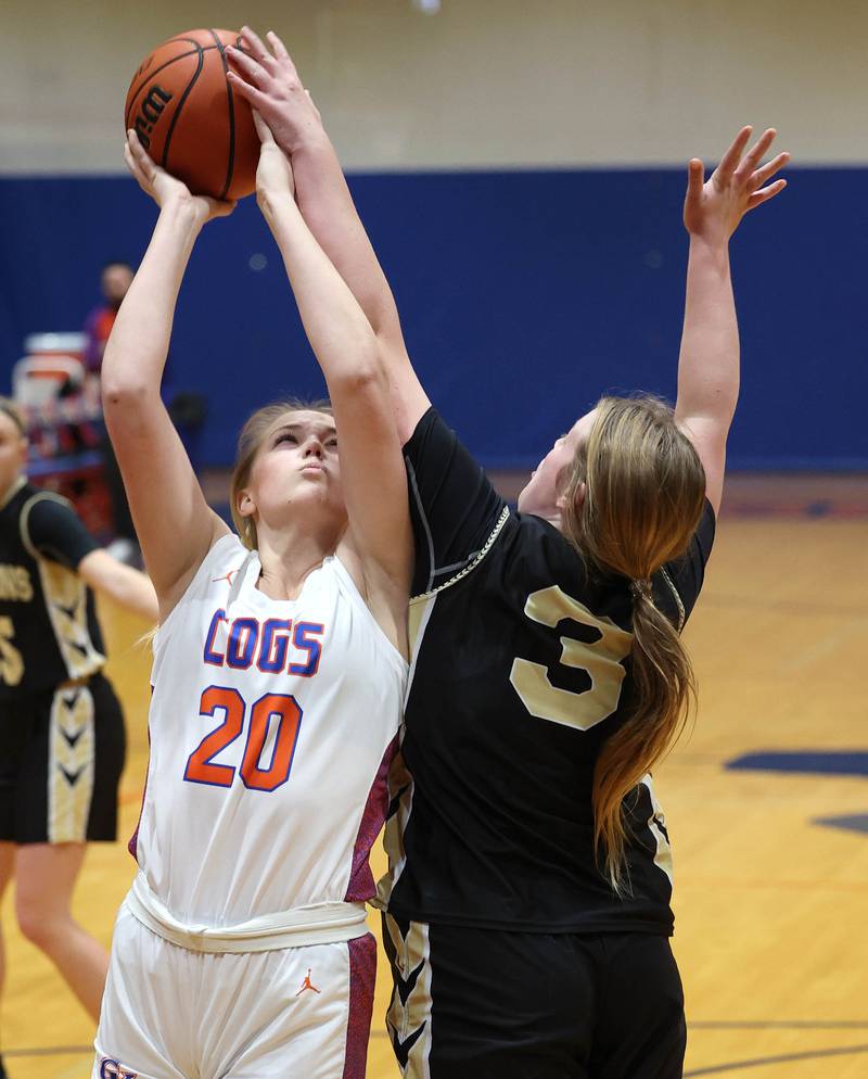 Genoa-Kingston's Bryce Boylen tries to shoot over Rockford Christian's Kaitlin Park during their game Friday, Jan. 13, 2023, at Genoa-Kingston High School.