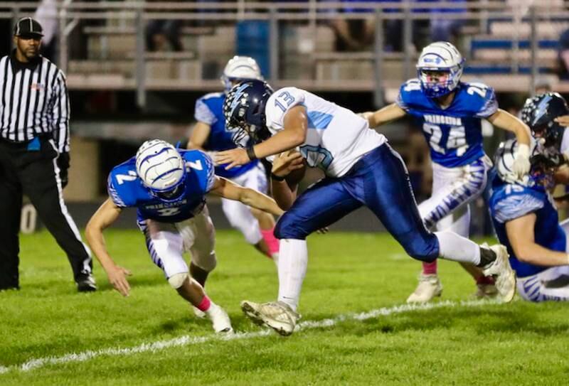 Bureau Valley's Levi Hardy runs against Princeton Friday night.