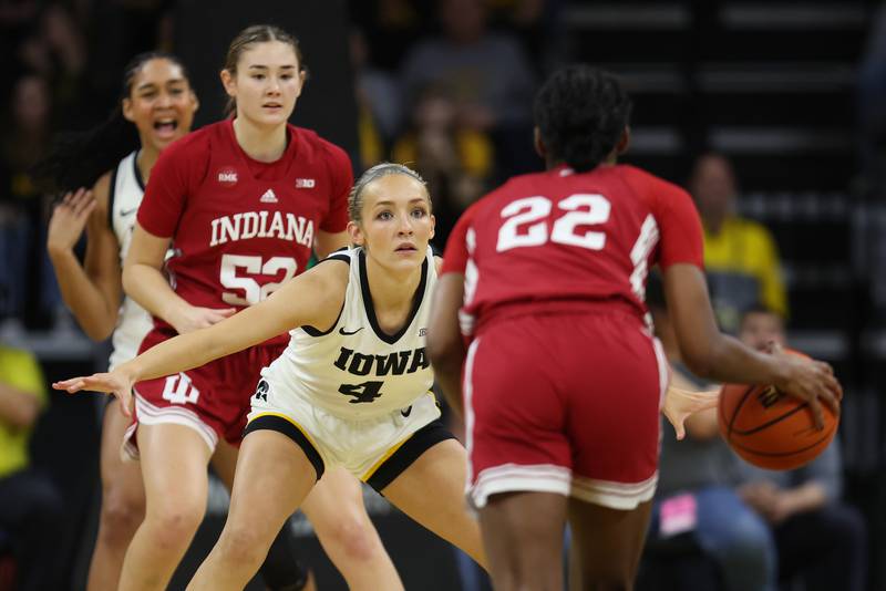 Iowa Hawkeyes guard Kylie Feuerbach (4) plays defense against Indiana on Saturday, January 13, 2024 at Carver-Hawkeye Arena.  (Brian Ray/hawkeyesports.com)