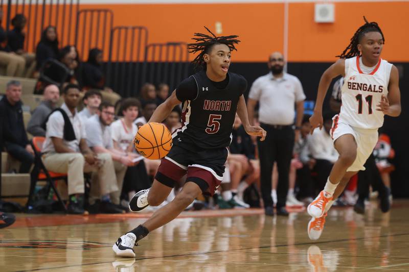 Plainfield North’s Darin Ashiru looks to make a play against Plainfield East on Tuesday, Jan 14, 2025.