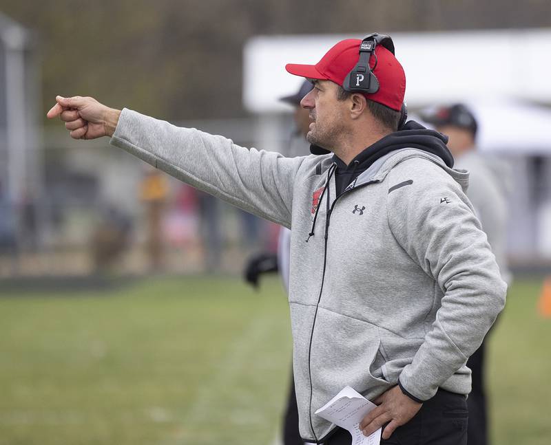 Amboy head coach Scott Payne directs his team Saturday, Nov. 9, 2024, in round two of the 8-man football playoffs.