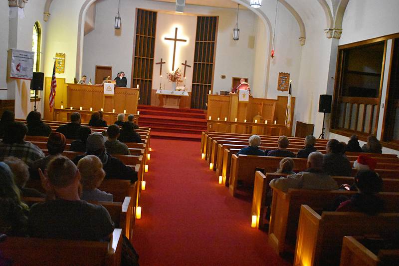 Names on the Rock Falls Hometown Holiday’s Love Light tree are read at the United Methodist Church during the Christmas Walk on Friday, Nov. 21, 2025.