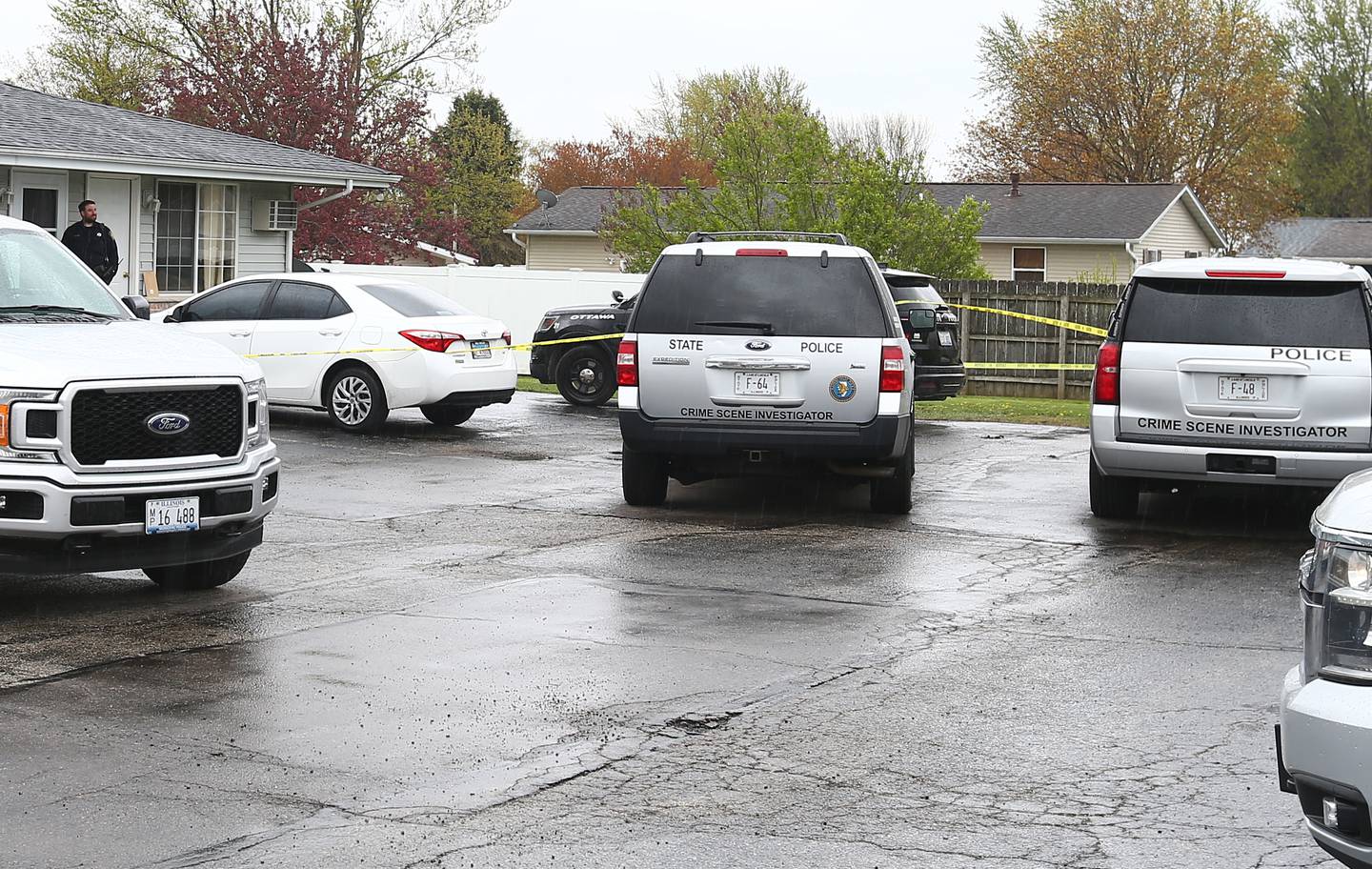 Illinois State Police crime scene investigator vehicles and Ottawa Police are on the scene at 321 W. McKinley Road in Ottawa on Monday April 19, 2021.