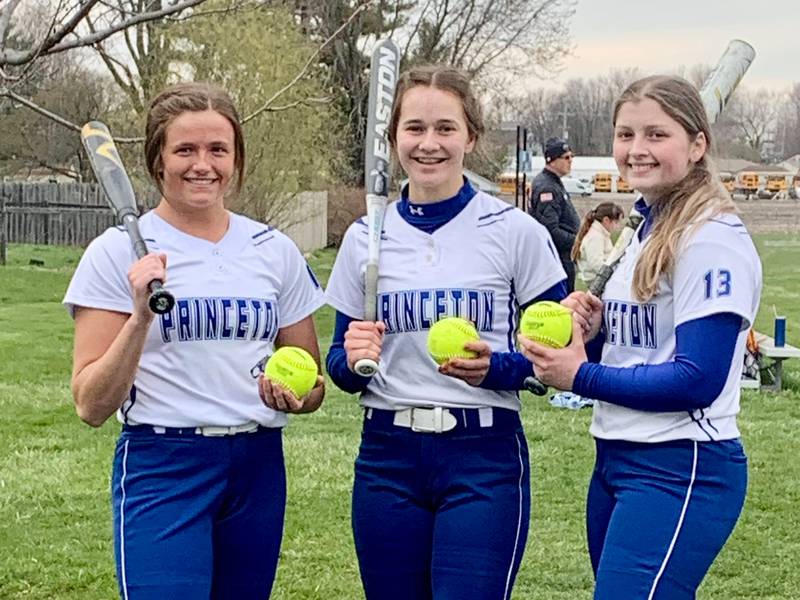 Princeton's Mckenzie Hecht (left), Hannah Muehlschlegel and Libby Boyles homered i consecutive innings to power the Tigresses to a 9-2 win over Kewanee in TRAC East softball play Tuesday at Little Siberia.