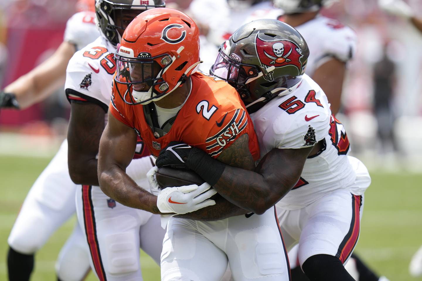 Chicago Bears wide receiver DJ Moore gets held up by Tampa Bay Buccaneers linebacker Lavonte David during the first half, Sunday, Sept. 17, 2023, in Tampa, Fla.