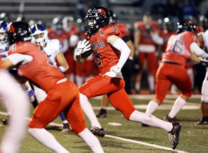 Glenbard East's Lucas Freese (5) runs during the varsity football game between Riverside Brookfield and Glenbard East on Friday, Oct. 24, 2025 in Lombard, IL.