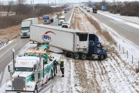 Photos: Snow squall causes major closure of Interstate 80 involving multiple accidents between Utica and Ottawa