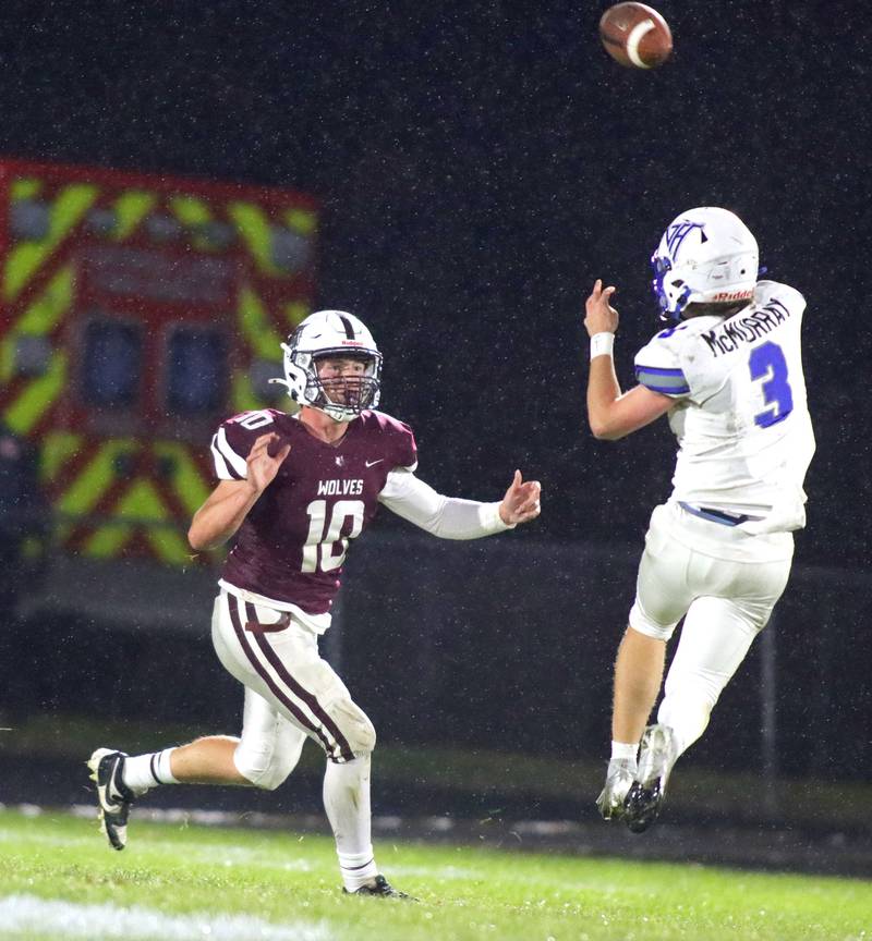 Prairie Ridge’s  Owen Satterlee pressures Vernon Hills’ quarterback Colin McMurray in IHSA football Class 5A first-round playoff action at Prairie Ridge High School in Crystal Lake on Friday, October 31, 2025.
