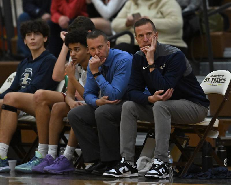 Lemont's head coach Rick Runaas looks on during the WJOL Basketball Tournament on Monday, November 21, 2022, at Joliet.