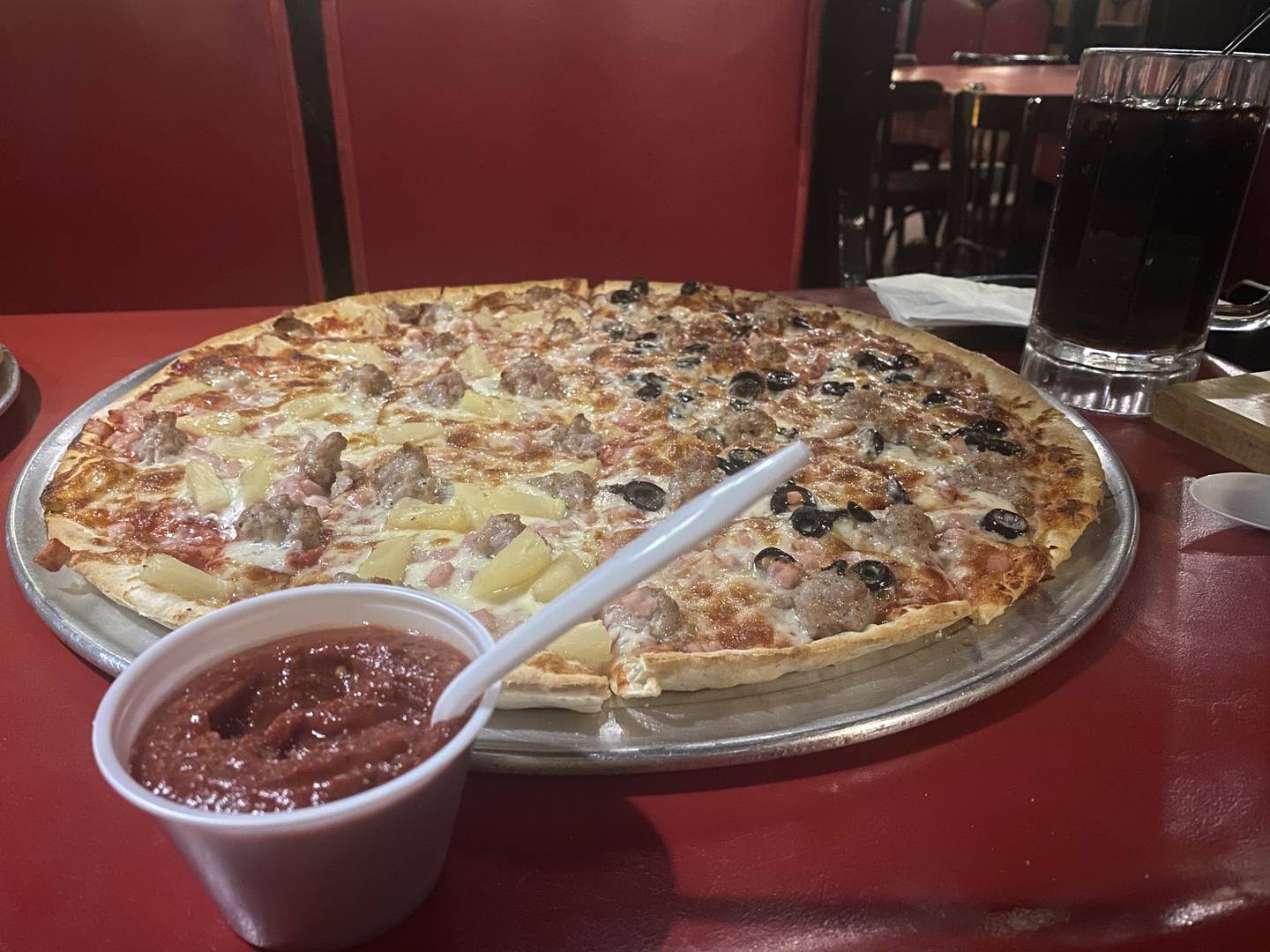 Whatever your preferred toppings, the Mystery Diner highly recommends slathering your pie with Bianchi's hot sauce, a tomato paste-like condiment that brings both a tangy flavor and a bit of heat.