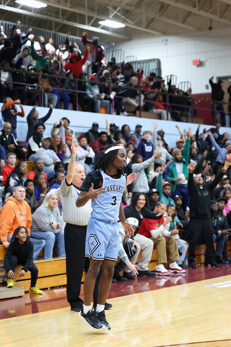 The crowd erupts as Kankakee's Cedric Terrell III hits the go-ahead 3-pointer in the fourth quarter during the Kays' 54-50 victory over Lincoln-Way Central in the 75th Kankakee Holiday Tournament maroon bracket championship on Sunday, Dec. 28, 2025.