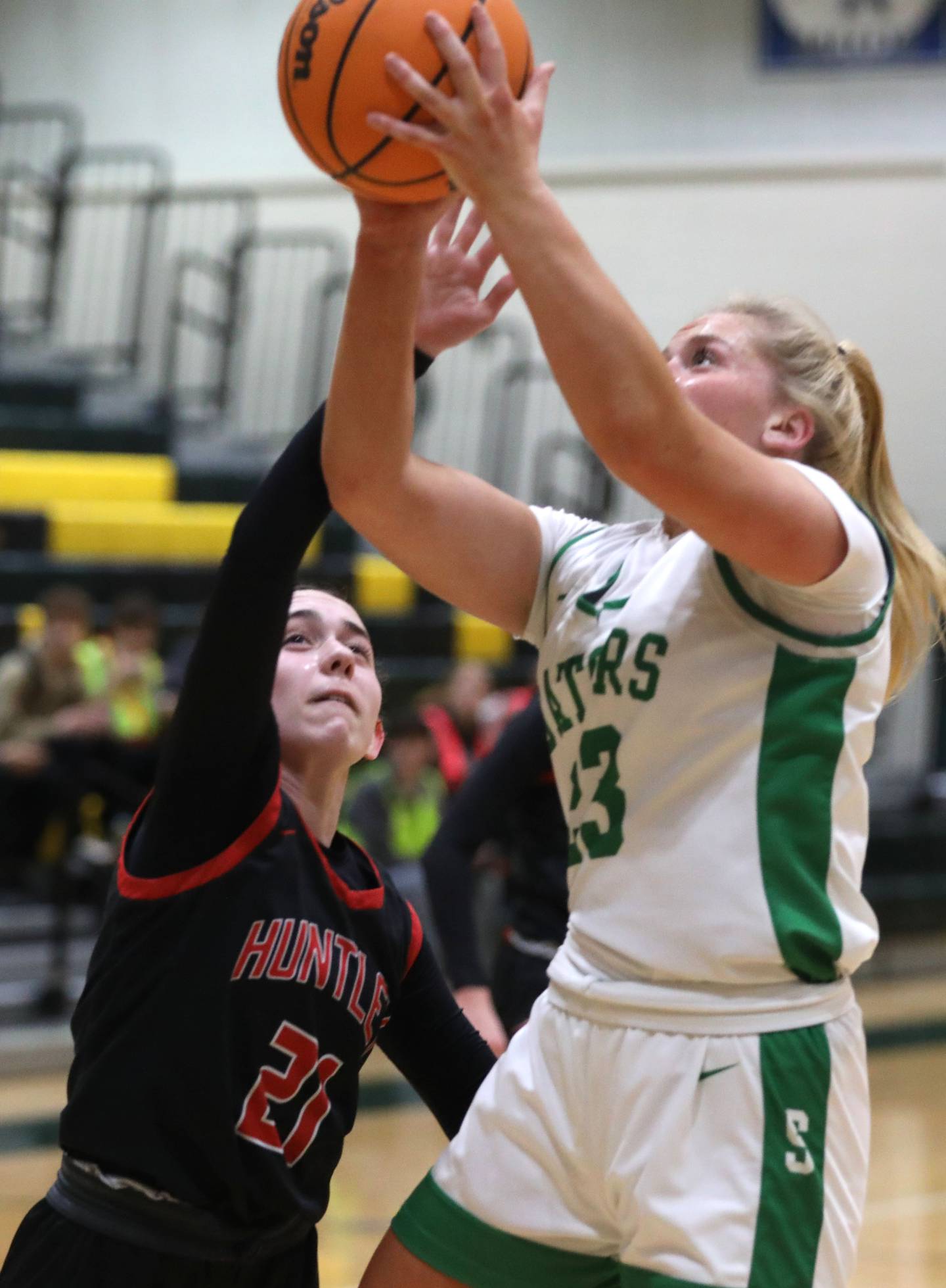 Crystal Lake South's Laken LePage drives to t basket against Huntley's Luca Garlin during a Fox Valley Conference girls basketball game on Friday, Jan. 30, 2026, at Crystal Lake South High School.