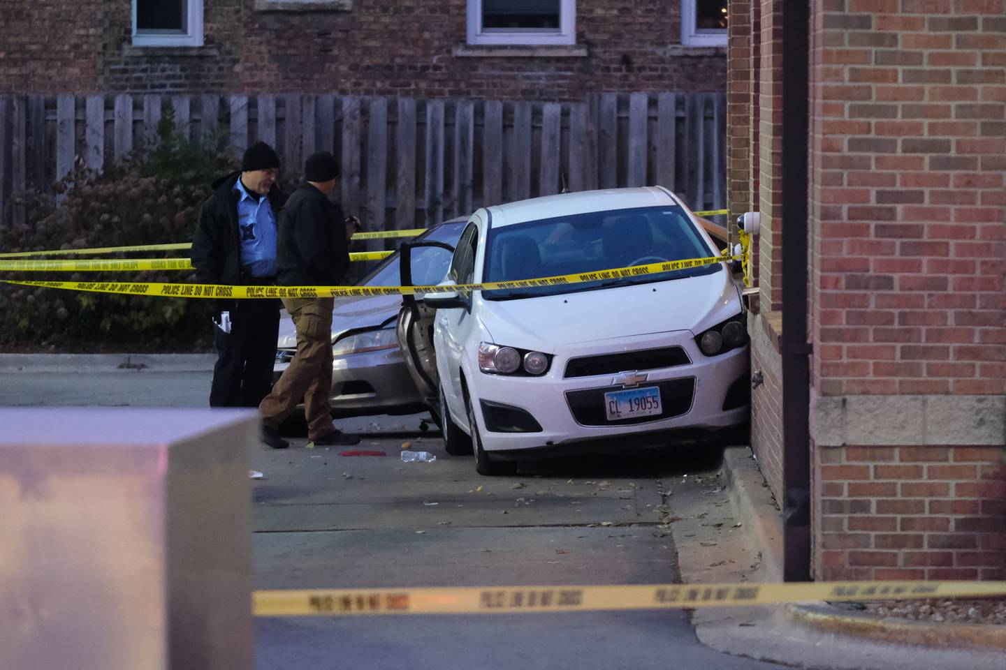 Police work the crime scene of a shooting outside Wendy's at W. Jefferson St. and N. Center St. Tuesday, Nov.16, 2021 in Joliet.