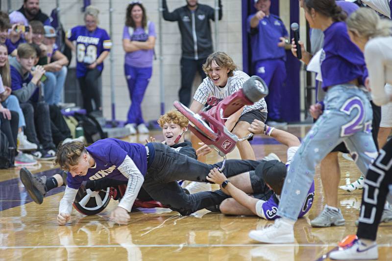 A big pile up at the finish line between junior and senior class members elicit laughs and cheers Friday, Sept. 30, 2022 at Dixon high's homecoming pep rally.