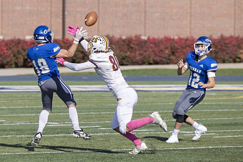 Newman’s Brady Grennan passes back to a QB Evan Bushman on a botched play that turned into a gain against ROWVA Saturday, Oct. 28, 2023 in the Class 1A playoffs in Sterling.