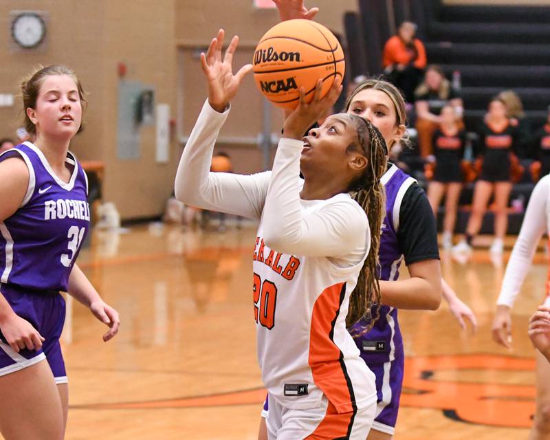 DeKalb's Zora Watts, center, makes a basket during the game while taking on Rochelle on Monday Dec. 2, 2024, held at DeKalb High School.