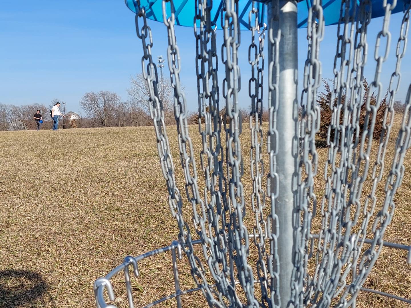 The Washkowiak family plays a round Sunday, March 3, 2024, of disc golf on the new course at Rotary Park in La Salle.