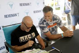 Vertical Dispensary hosts grand opening in Cary with former Bears quarterback Jim McMahon