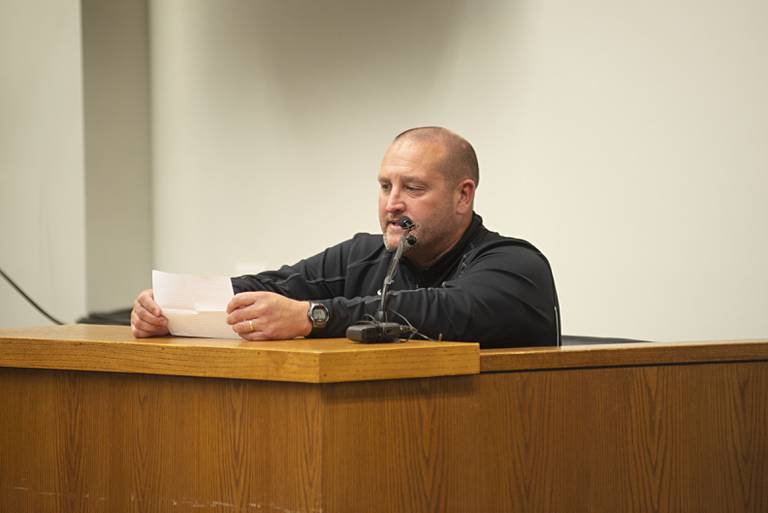 Dixon principal Jared Shaner reads a victim impact statement at the sentencing of Dixon High School shooter Matthew Milby.