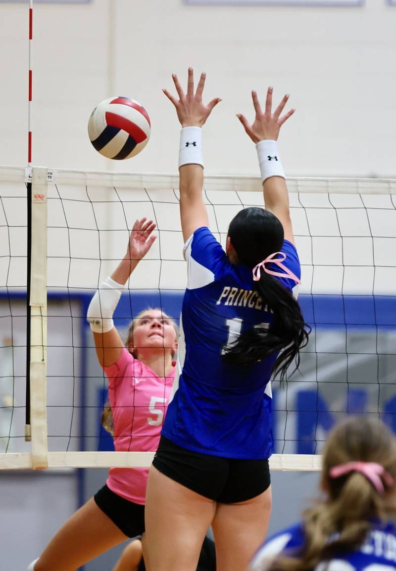 Hall's Charlie Pellegrini tries to hit over Princeton's Keely Lawson Thursday night at Prouty Gym.