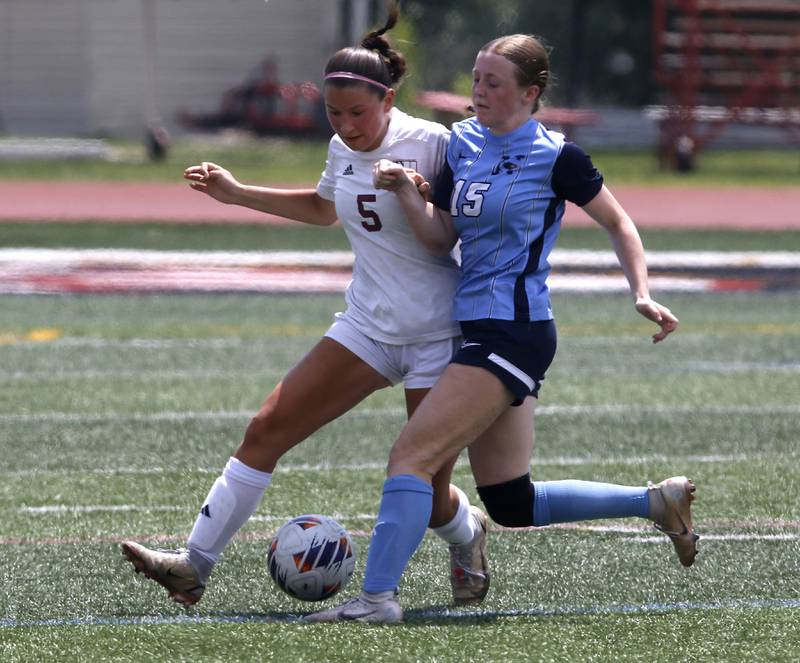 Nazareth Academy's Molly Moore tries to knock St. Ignatius College Prep's Izzy Radecki of the ball during a IHSA Class 2A State Girls Soccer semifinal match on Friday, June 6, 2025, at North Central College in Naperville.