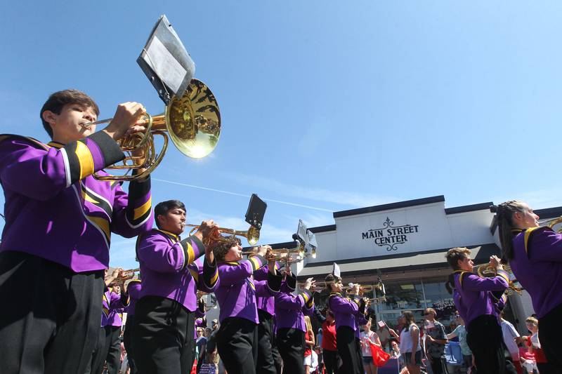 The Wauconda High School Marching Bulldogs make their way down Main Street on Monday, May 29, 2023, during the Wauconda Memorial Day Parade.