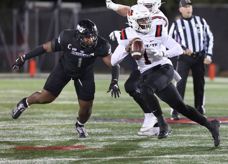 Northern Illinois' James Ester takes aim at Ball State quarterback Kiael Kelly during their game Tuesday, Nov. 7, 2023, in Huskie Stadium at NIU in DeKalb.