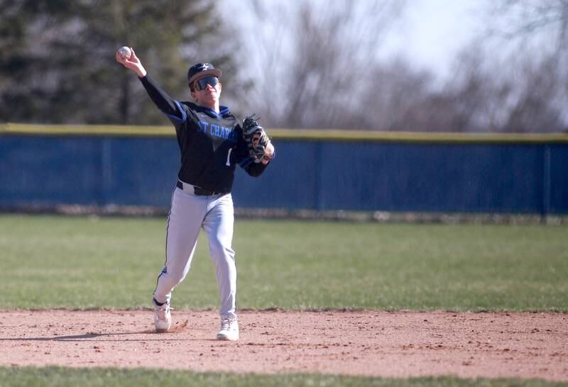 St. Charles North’s Nolan Macholz throws to first for an out during a game on Tuesday, April 8, 2025 at Burlington Central.