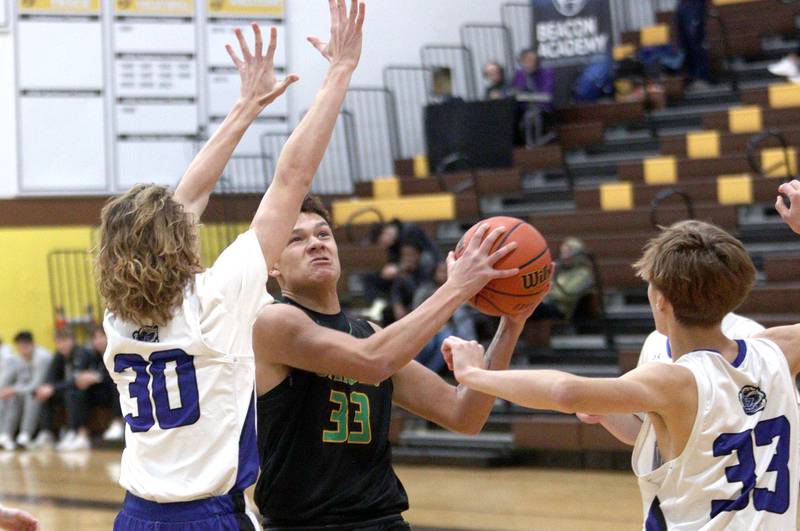 Crystal Lake South’s Cooper Buelna works under the hoop against Lake Zurich in Hinkle Holiday Classic boys basketball tournament game action at Jacobs High School Wednesday.