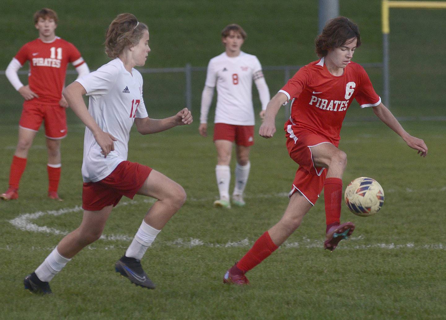 Ottawa’s Collin Lyons gets the ball past Streator’s Dalton Sliker during the first half of Tuesday's match at Ottawa.