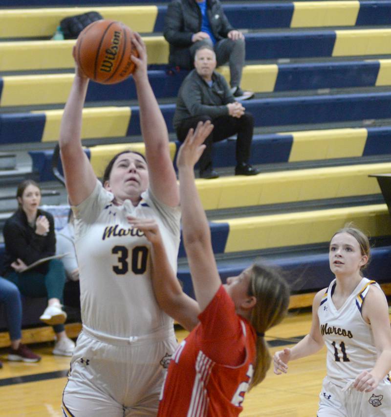 Polo's Leah Tobin (30) shoots against Oregon during Tuesday, Dec. 5, 2023 action at Polo High School.