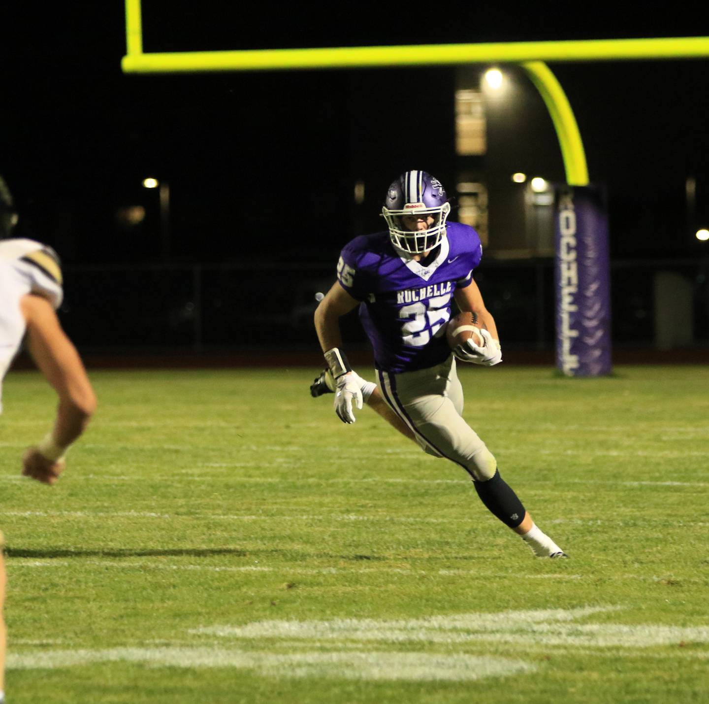 Rochelle's Brode Metzger looks for daylight during Friday's game with Lena-Winslow in Rochelle.