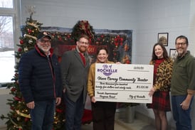 City of Rochelle presents facade grant to Vince Carney Community Theater