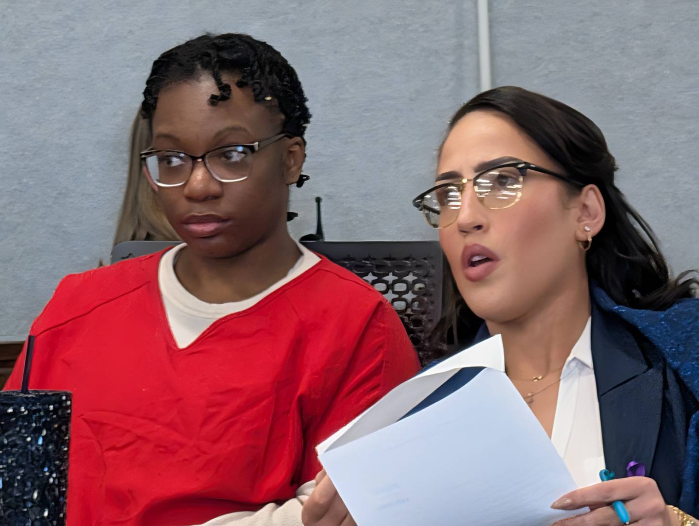 Xandria Harris, left, and attorney Cierra Norris listen to Kankakee County Circuit Judge Kathy Bradshaw-Elliott on Monday, March 9, 2026.