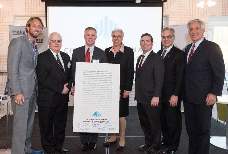Lake County Chairman Aaron Lawlor (from left), Will County Executive Larry Walsh, Chicago Regional Growth Corp. Executive President Tom Hulseman, Cook County President Toni Preckwinkle, Kendall County Board Chairman Scott Gryder, Deputy Mayor of Chicago Robert Rivkin and Kane County Board Chairman Chris Lauzen pose for a photo during a recent gathering of the Chicago Regional Growth Corp.