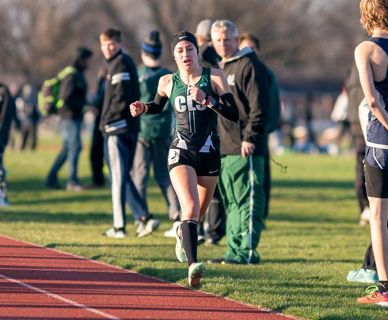 Crystal Lake South’s Isabella Gonzalez competes in the 3200-meter race during the Matt Wulf Invitational track and field meet at Yorkville High School on Thursday, April 14, 2022.