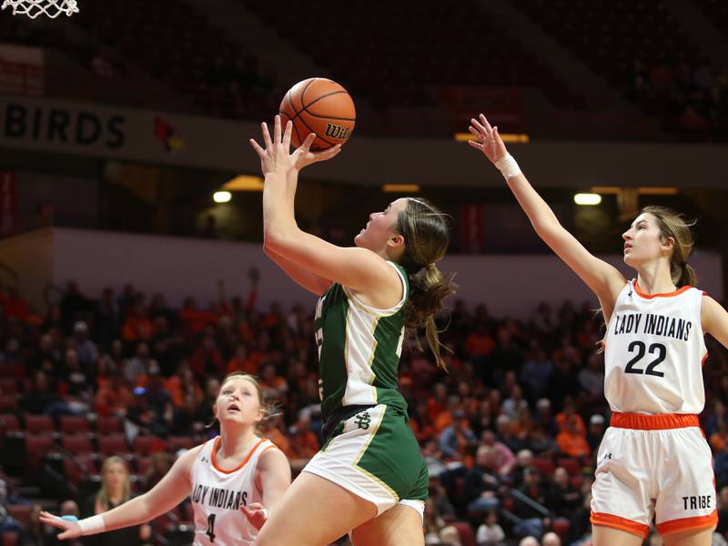 St. Bede's Ella Hermes runs toward the hoop past Altamont's Libby Reardon and teammate Kylie Osteen during the Class 1A third-place game on Thursday, Feb. 29, 2024 at CEFCU Arena in Normal.