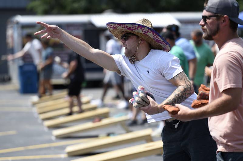 TJ Norton, of Crown Point, Ind., competes in the cornhole tournament in Momence on Sunday, August 10, 2025. The bags tournament was the largest ever for the area, with 162 participants.