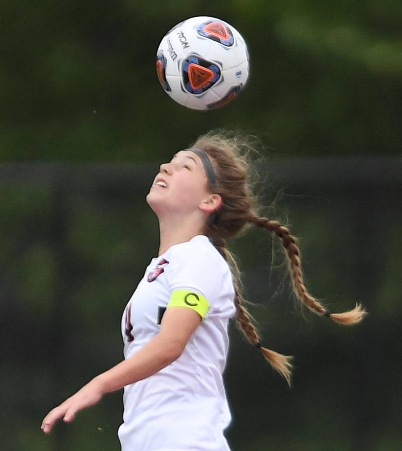 Lincoln-Way Central’s Christine Erdman stretches for the ball against Evanston in the Class 3A IHSA state girls soccer third-place game in Naperville on Saturday, June 4, 2022.
