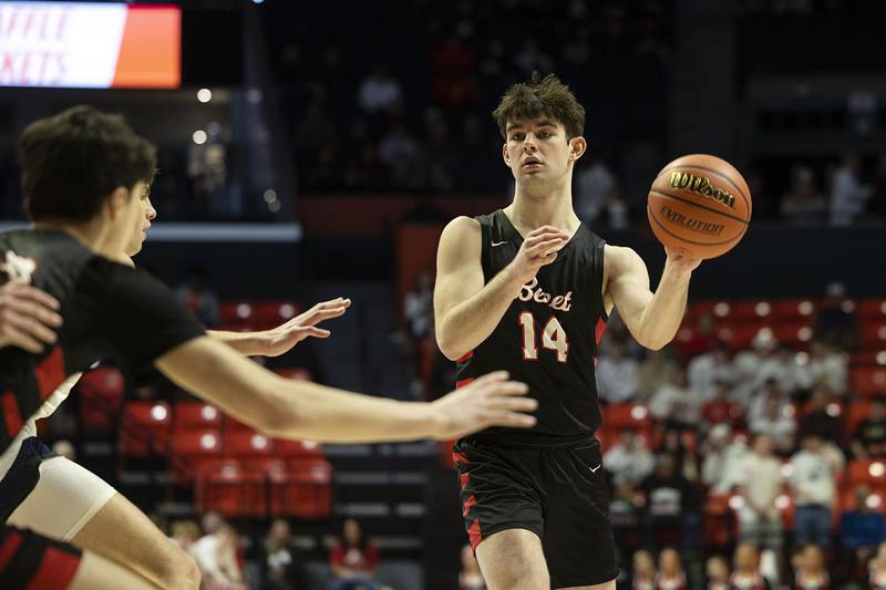Benet Academy’s Parker Sulaver makes a pass against New Trier Friday March 10, 2023 during the 4A IHSA Boys Basketball semifinals.