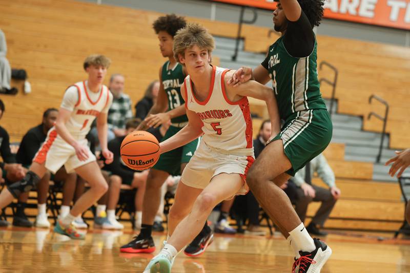 Lincoln-Way West’s Luke Gouty works under the basket against Plainfield Central on Saturday, Jan 3, 2026 in New Lenox.