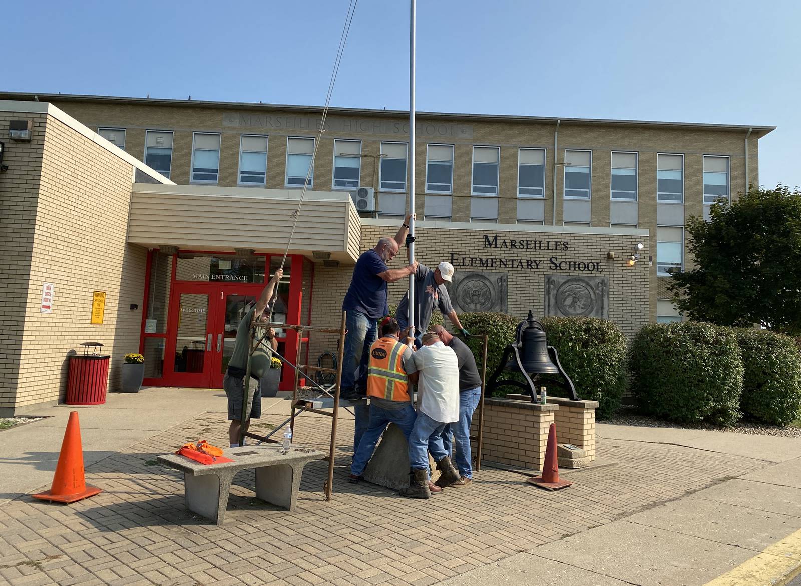 Laborers Local 393 replace flagpole at Marseilles Elementary Shaw Local