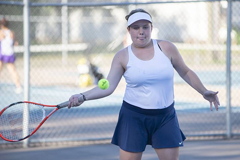 Sterling’s Riley Dunn eyes the ball Thursday, Sept. 29, 2022 while playing doubles against Dixon.