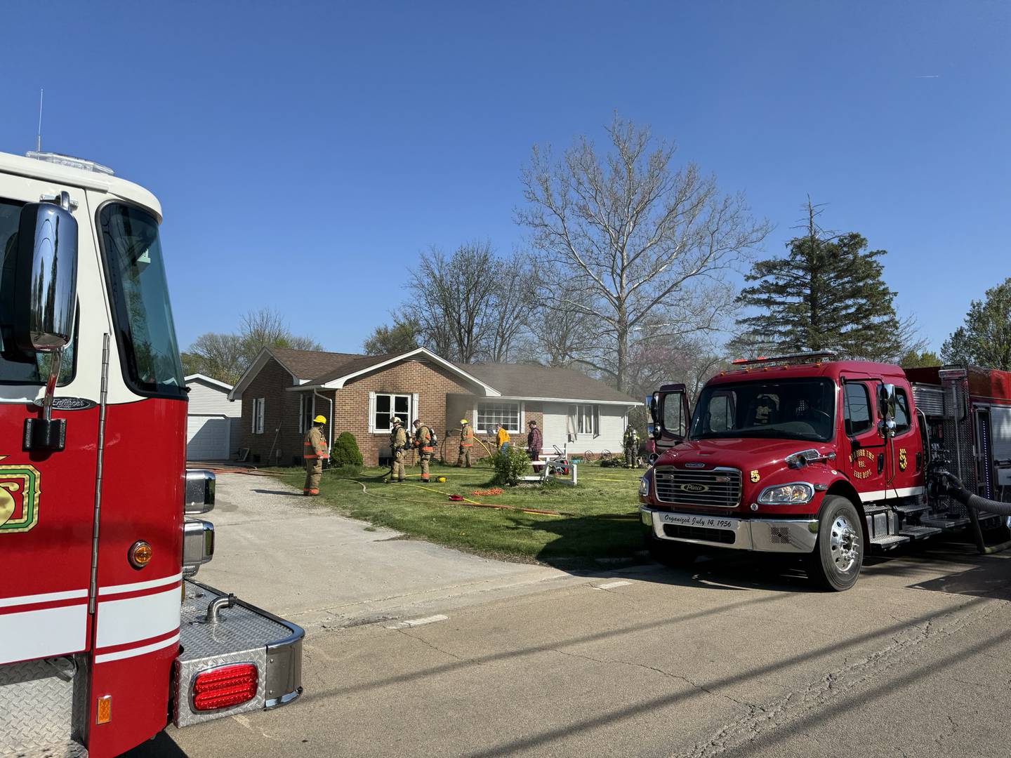 Reading Volunteer firefighters knock down a fire at 1621 S. Bloomington St. on Wednesday, April 24, 2024.