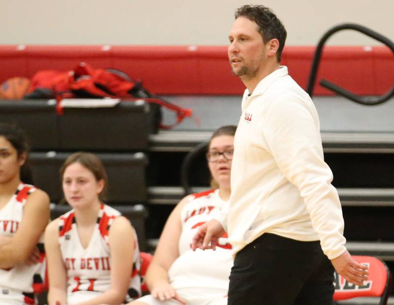 Hall head girls basketball coach TJ Orlandi coaches his team while playing St. Bede on Monday, Nov. 28, 2022 at Hall High School in Spring Valley.