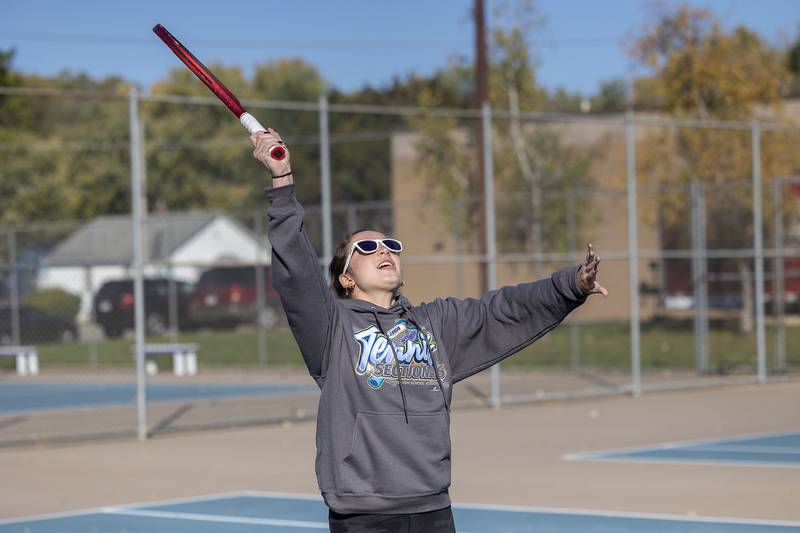 Dixon tennis player Jenna Mustapha warms up with teammates Monday, Oct. 20, 2025.